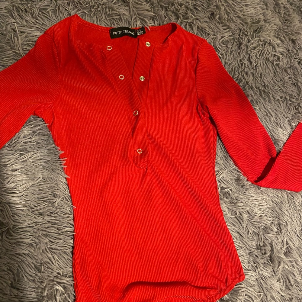 Red long sleeve button up bodysuit